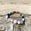 Artisan Crafted Natural Stone bracelet stack of two, handmade in Byron Bay. Features natural White Alabaster, Howlite, Rose Quartz, Amethyst, Peridot, Citrine, Carnelian, Red Coral, Hematite, and Lava Stone beads.