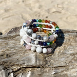 Artisan Crafted Natural Stone essential oil bracelet handmade in Byron Bay. Features natural White Alabaster, Howlite, Rose Quartz, Amethyst, Peridot, Citrine, Carnelian, Red Coral, Hematite, and Lava Stone beads.