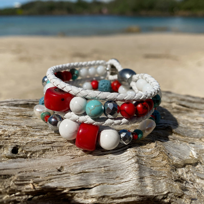 Artisan Crafted Natural Stone bracelet handmade in Byron Bay. Features Natural white and Blue Howlite, Tridacna, African Turquoise, Red Coral and Lava Stone beads.