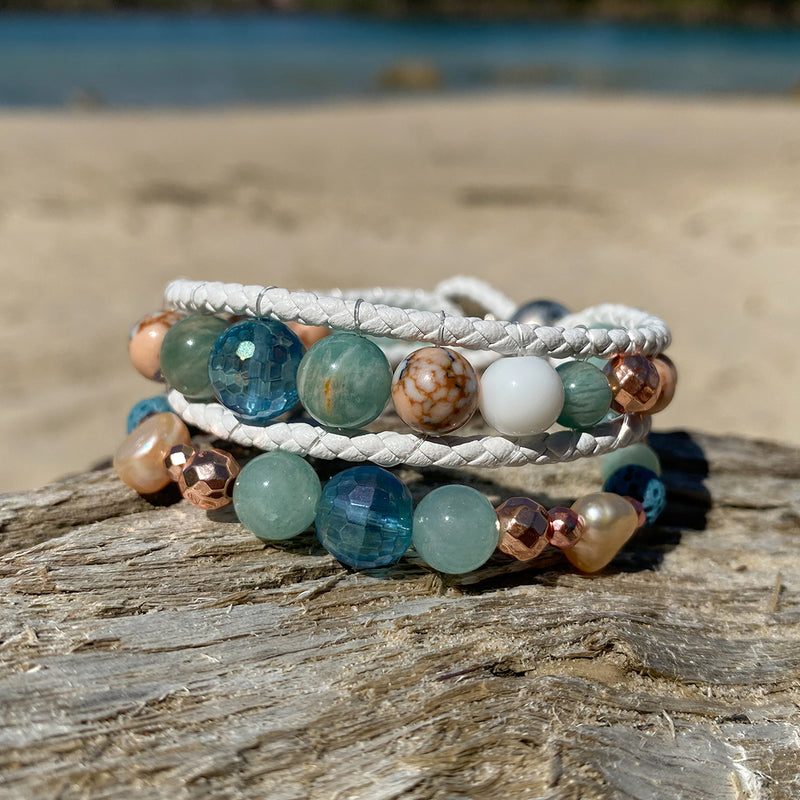 Stack of two artisan crafted natural crystal and lava stone beaded bracelet. Suitable for diffusing essential oils such as young living or Doterra. Handmade in Byron Bay. Great gift for  women. Features Ocean jasper & Amazonite crystals and freshwater pearls.