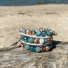 Stack of three artisan crafted natural crystal and lava stone beaded bracelet. Suitable for diffusing essential oils such as young living or Doterra. Handmade in Byron Bay. Great gift for  women. Features Ocean jasper & Amazonite crystals and freshwater pearls.