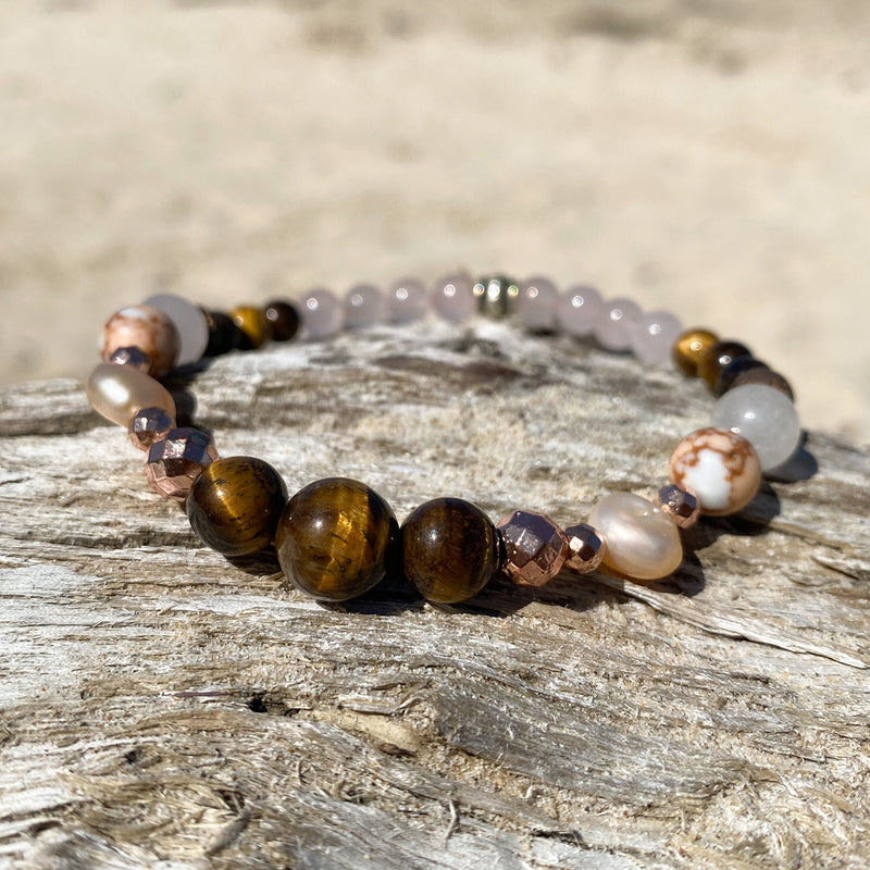 Artisan Crafted Natural Stone bracelet stack of two, handmade in Byron Bay. Features natural Tiger Eye, Rose Quartz, Freshwater Pearl, Hematite, and Lava Stone beads.