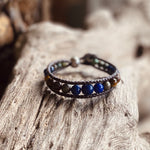 Artisan Crafted Natural Stone Leather Wrap bracelet handmade in Byron Bay. Features Natural Lapis Lazuli, Tiger Eye, African Turquoise, Pyrite and Lava Stone beads.