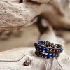 Artisan Crafted Natural Stone Leather Wrap bracelet handmade in Byron Bay. Features Natural Lapis Lazuli, Tiger Eye, African Turquoise, Pyrite and Lava Stone beads.