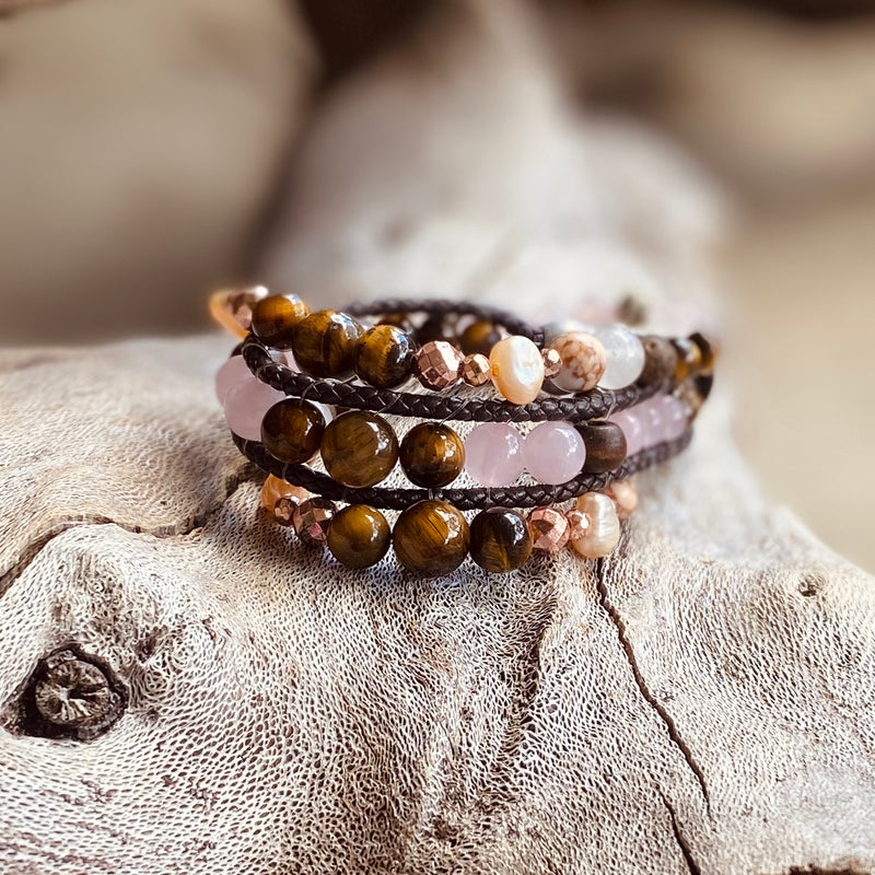Artisan Crafted Natural Stone bracelet stack of three, handmade in Byron Bay. Features natural Tiger Eye, Rose Quartz, Freshwater Pearl, Hematite, and Lava Stone beads.