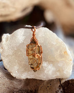 Artisan crafted natural double terminated Smokey Citrine pendant necklace, handmade in Byron Bay. Wrapped in pure, non-tarnish copper wire.