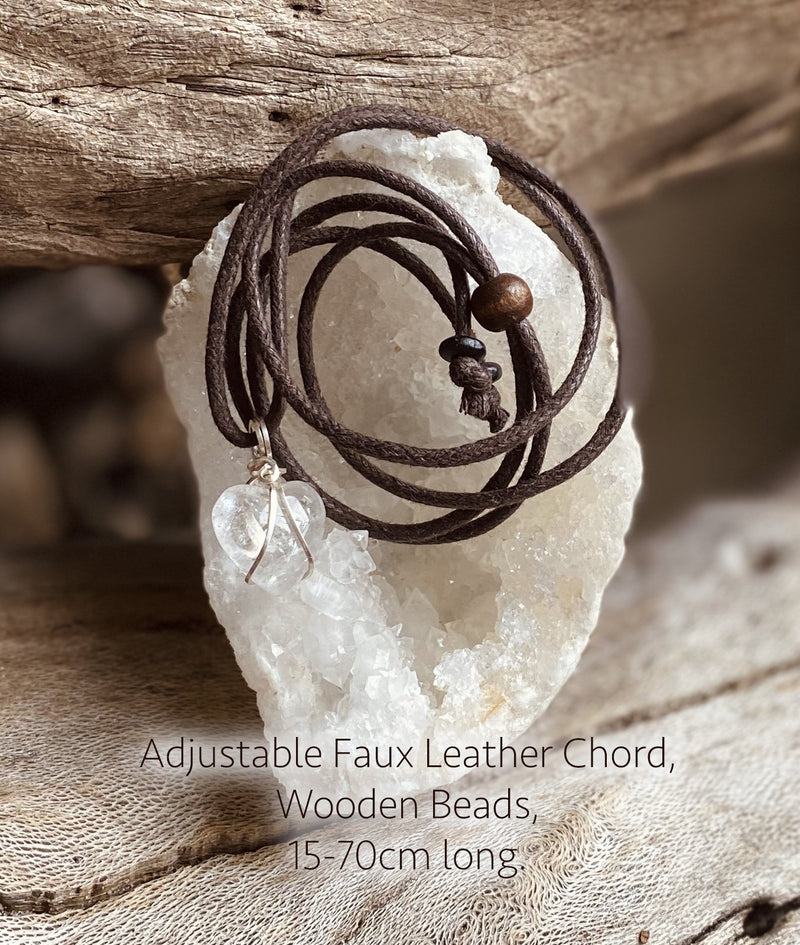 An adjustable length faux leather chord with wooden beads for wearing a crystal pendant. 