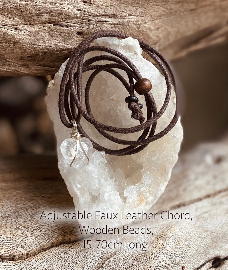 An adjustable length faux leather chord with wooden beads for wearing a crystal pendant. 