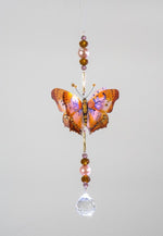 Beautiful hand made butterfly suncatcher by Kylee Joy in the colours of Autumn.
