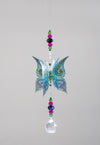 Hand made crystal suncatcher with an aquamarine butterfly motif. Made in Byron Bay, Australia.
