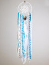 Handmade boho dream catcher by visionary artisan Kylee Joy in beautiful turquoise and white tones. 
